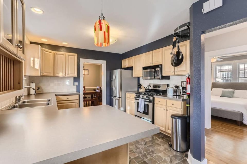 Kitchen or kitchenette, dishwasher, oven, stove, toaster