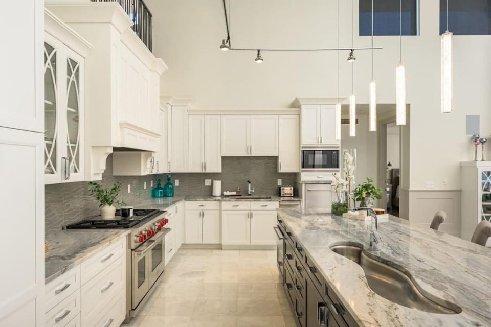 Kitchen or kitchenette, dishwasher, microwave, oven, stove