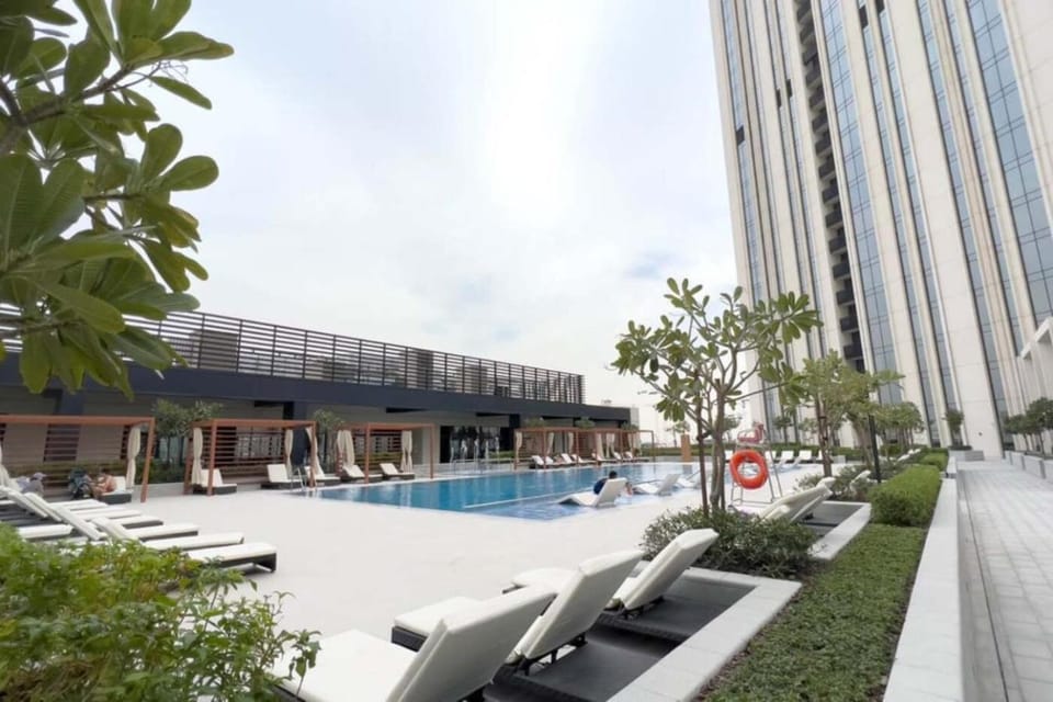Property building, Pool view, Swimming pool, sunbed