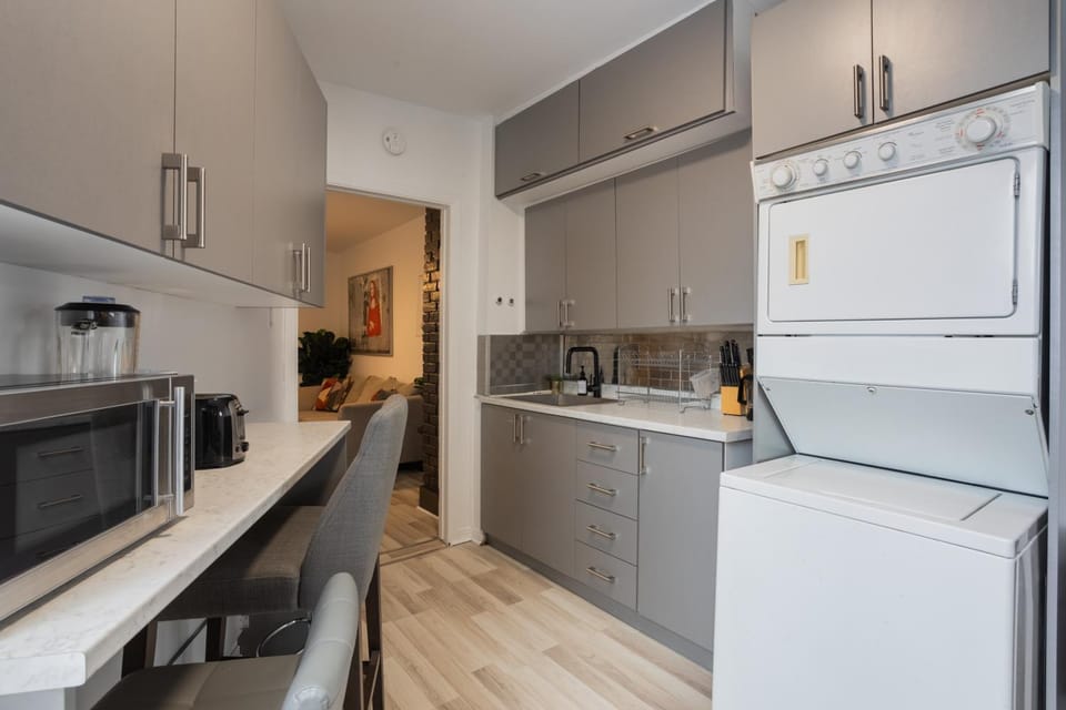 Kitchen or kitchenette, microwave, laundry, washing machine, dryer, kitchen