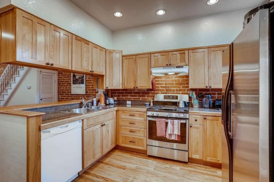 Kitchen or kitchenette, dishwasher, oven, stove, toaster