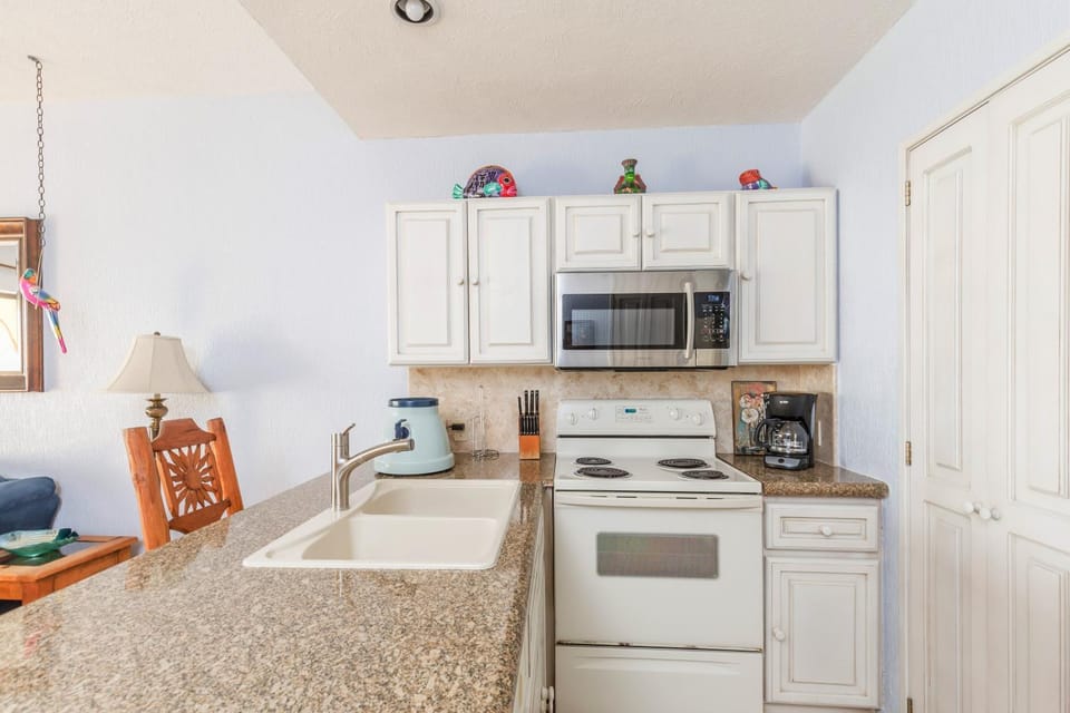 Kitchen or kitchenette, oven, stove