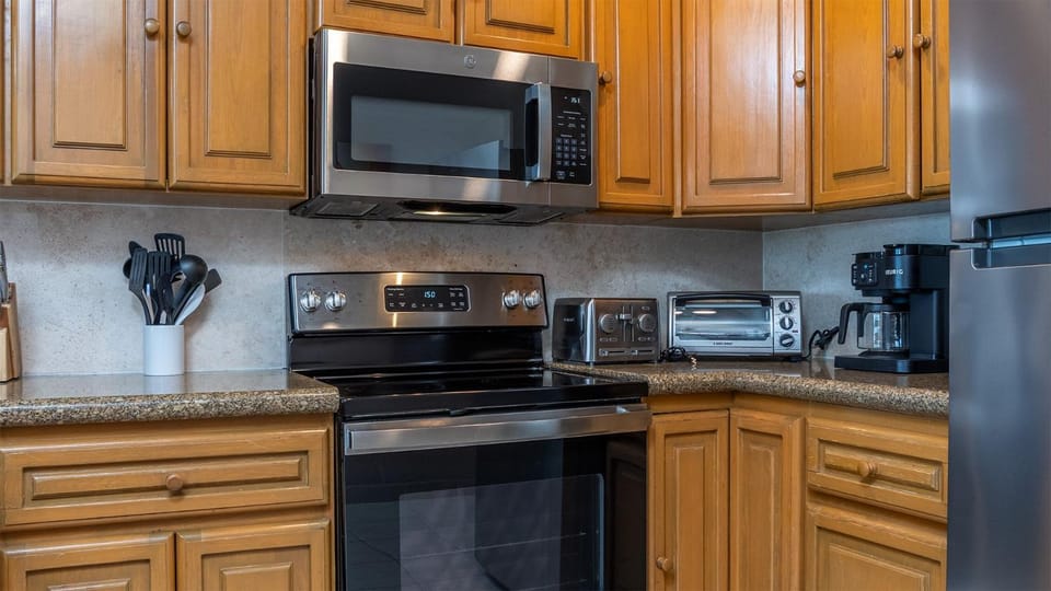 Kitchen or kitchenette, oven, stove