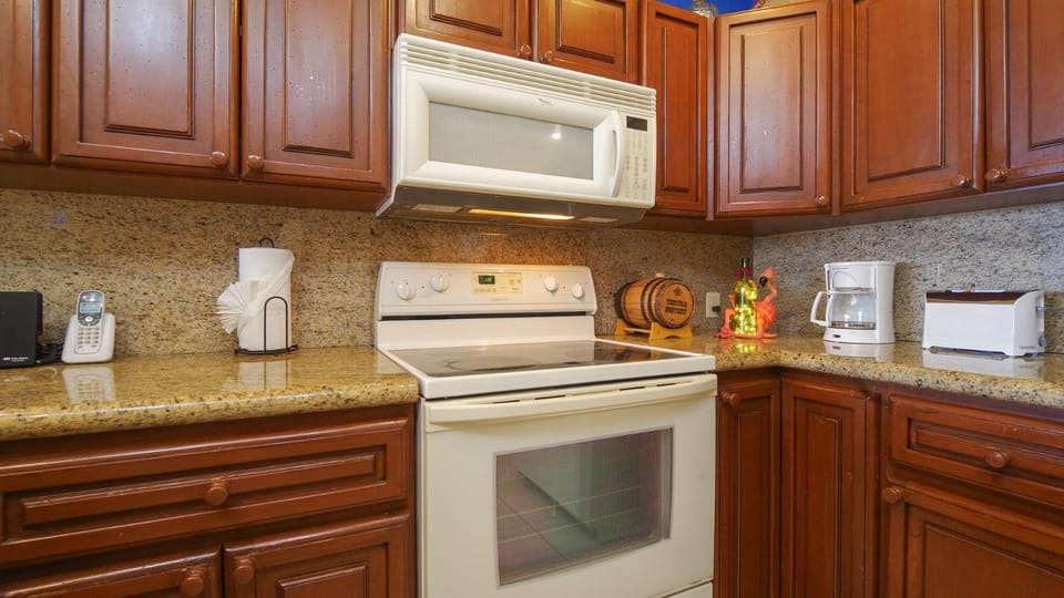 Kitchen or kitchenette, dishwasher, oven, stove, toaster, kitchen