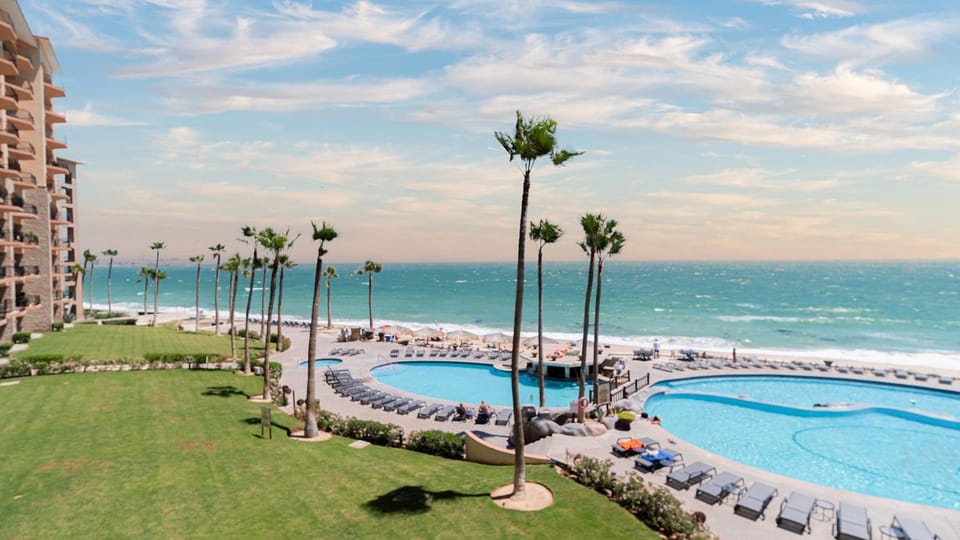 Property building, Day, Pool view, Sea view, Swimming pool, sunbed