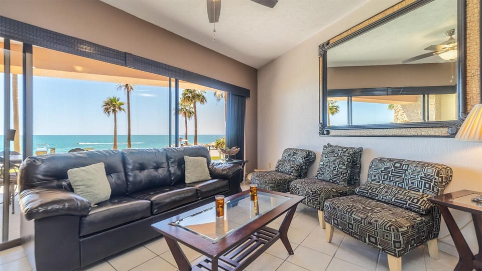 View (from property/room), Living room, Seating area, Sea view