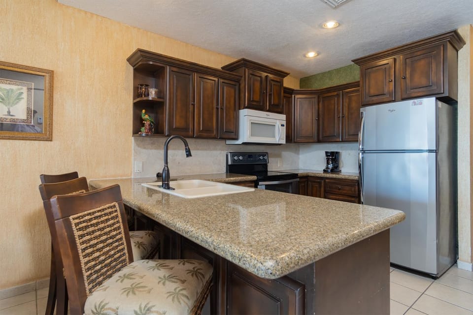 Kitchen or kitchenette, oven, stove