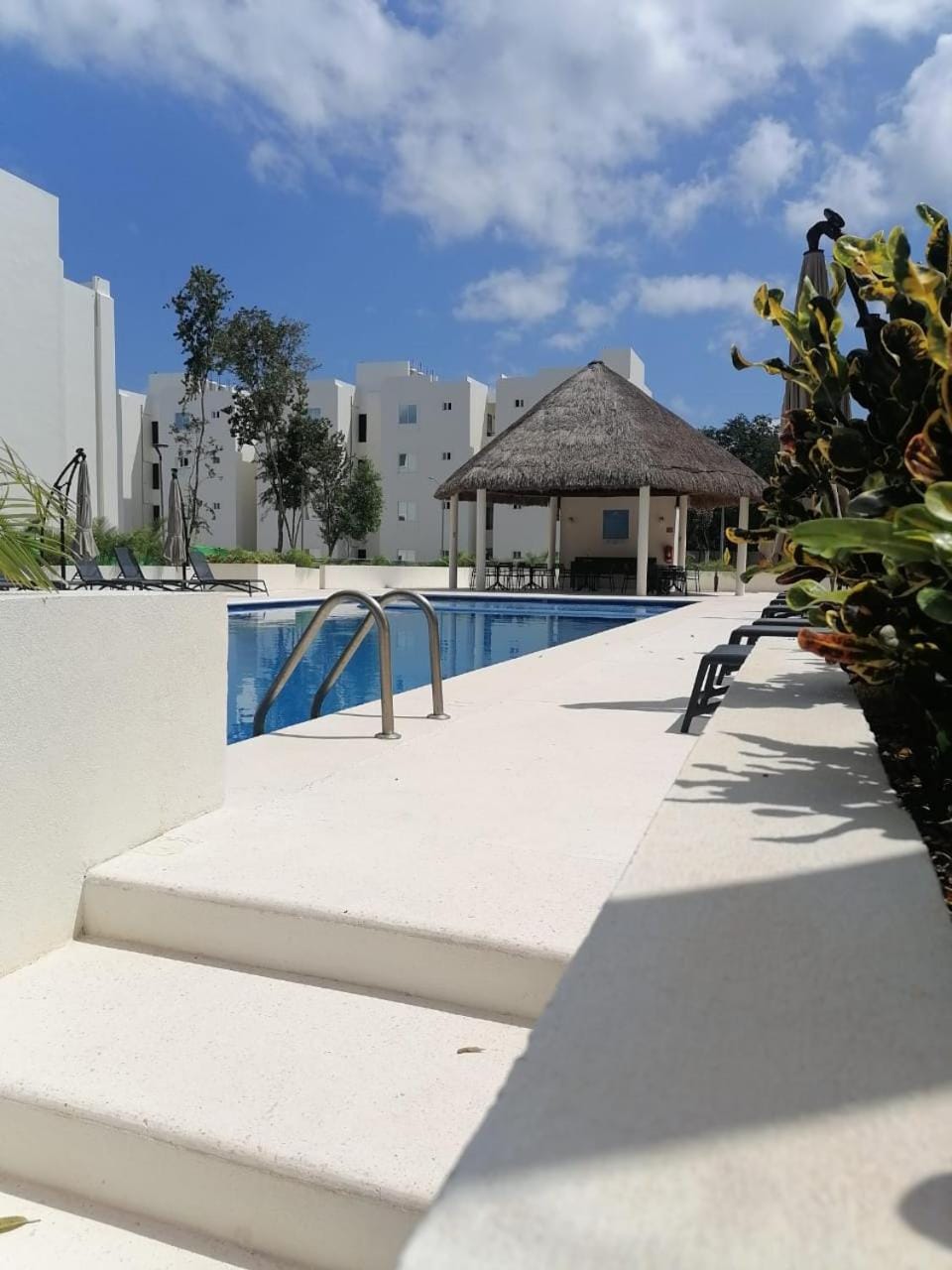 Property building, Patio, Day, View (from property/room), Balcony/Terrace, Pool view, Swimming pool, sunbed