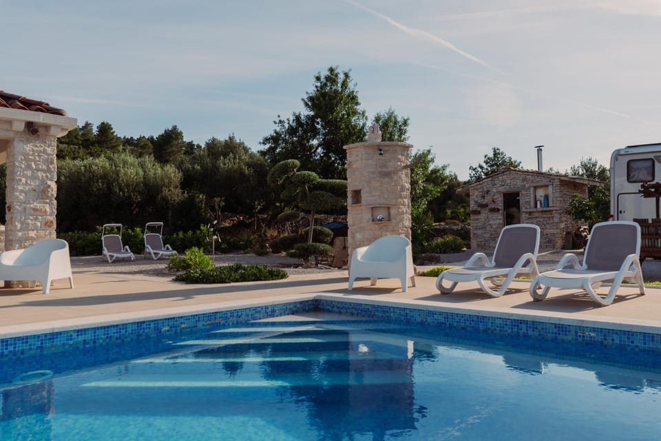 Swimming pool, sunbed