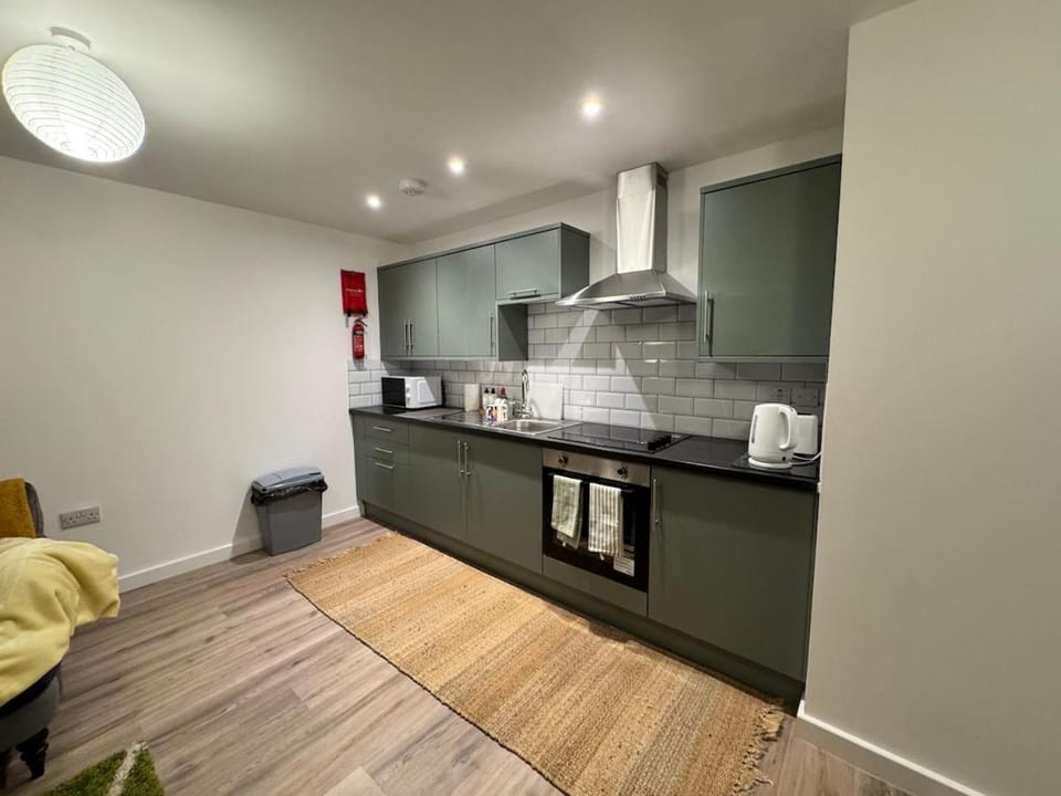 Kitchen or kitchenette, oven, stove, toaster