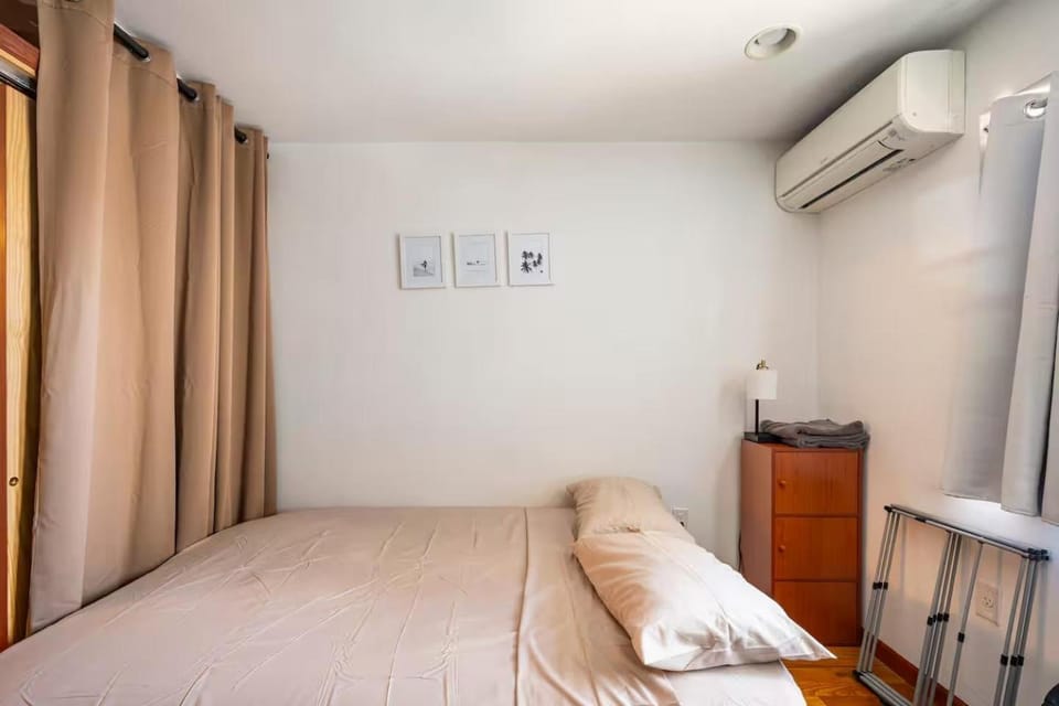 Bed, Photo of the whole room, Bedroom, towels, air conditioner