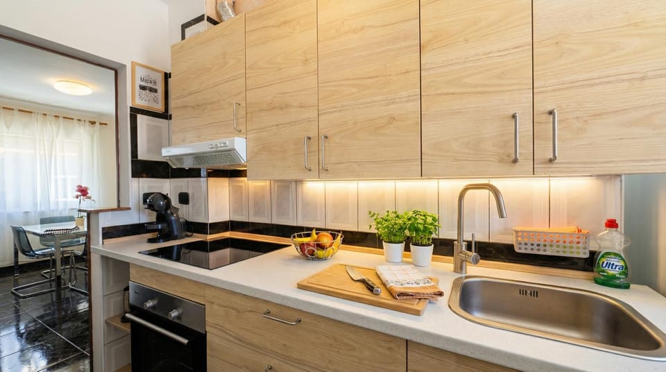 Kitchen or kitchenette, stove