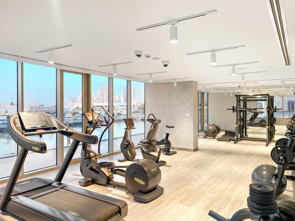 Elegant 1BR Apt with Balcony Views of Burj Khalifa & Dubai Canal Apartment in Dubai