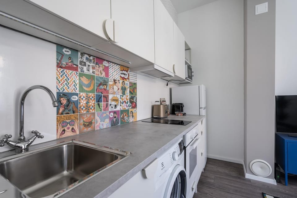 Kitchen or kitchenette, stove, washing machine