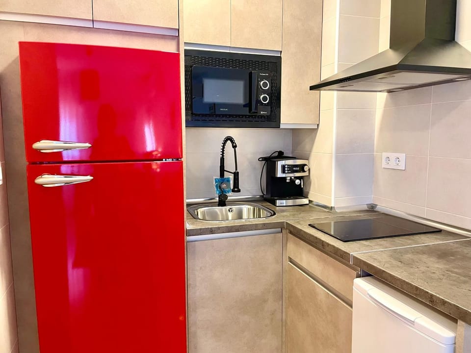 Kitchen or kitchenette, oven, stove, toaster