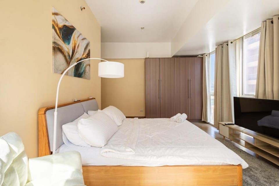 Minimalist Haven 3BR unit at Mckinley Hill Apartment in Makati