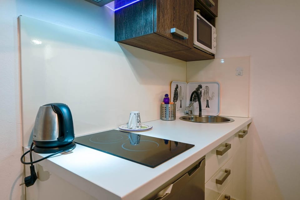 Kitchen or kitchenette, stove