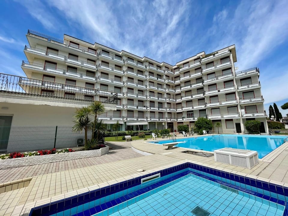 Bright apartment with shared pool Apartment in Porto Santa Margherita
