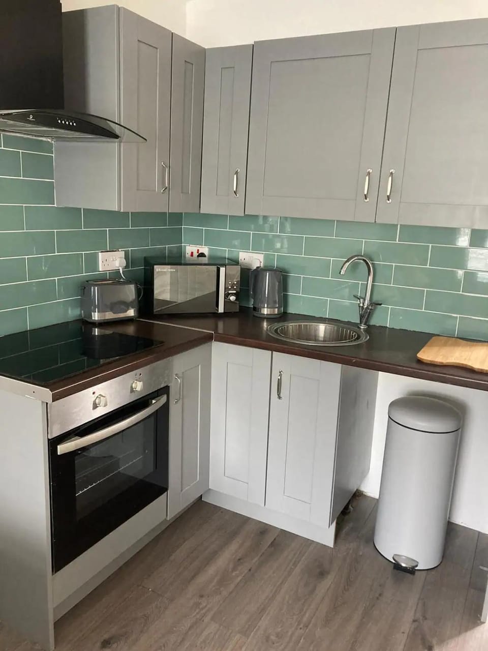 Kitchen or kitchenette, stove, toaster