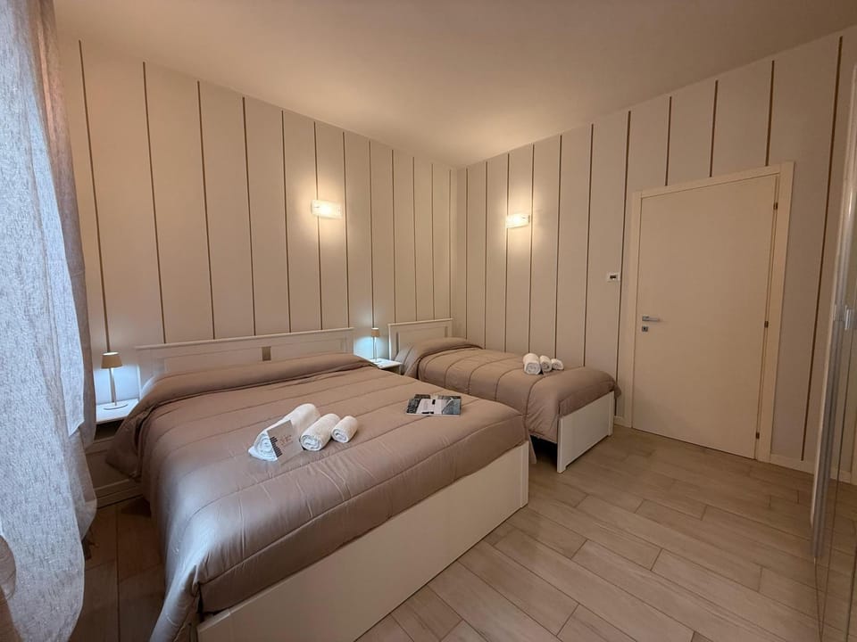 Bed, Living room, Photo of the whole room, Seating area, Bedroom, towels, wardrobe