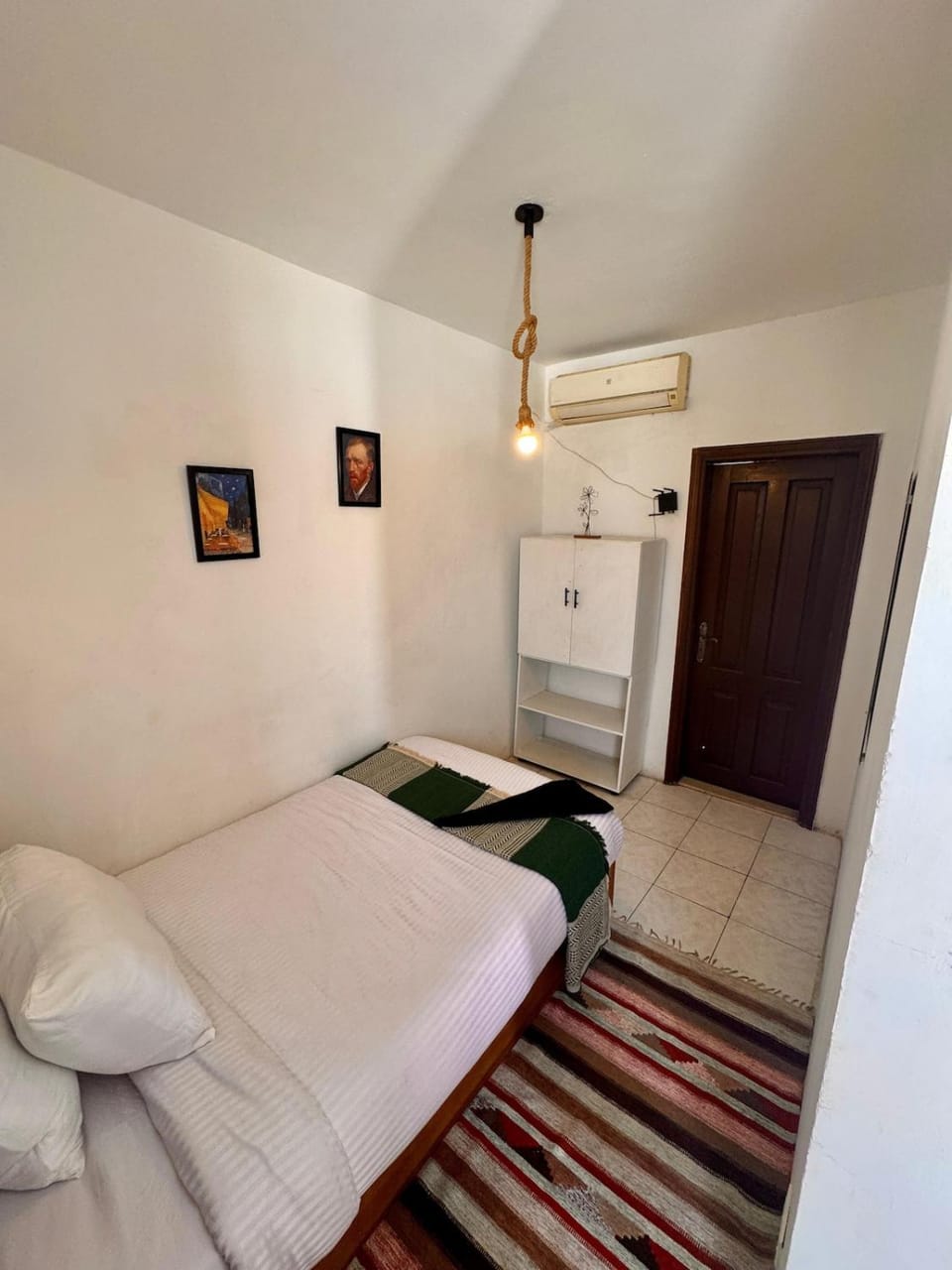 Bed, wardrobe, air conditioner