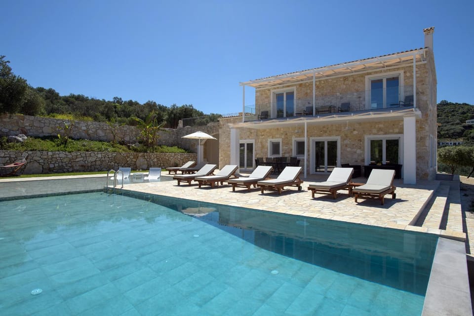 Property building, Patio, Day, Natural landscape, Pool view, Swimming pool, sunbed