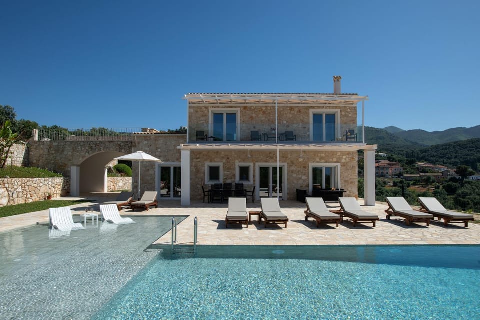 Property building, Patio, Day, Natural landscape, Pool view, Swimming pool, sunbed