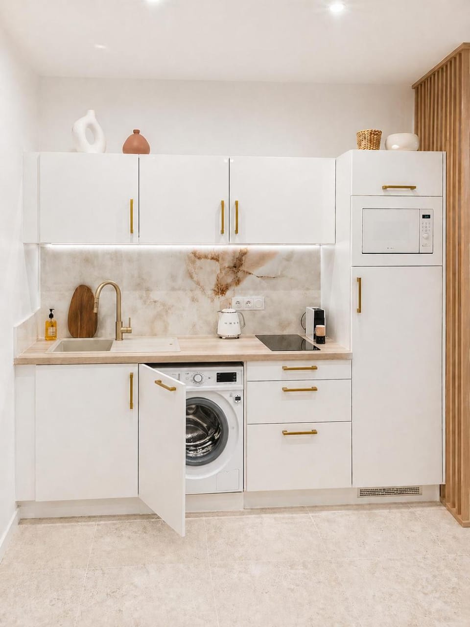 Kitchen or kitchenette, stove, washing machine, dryer