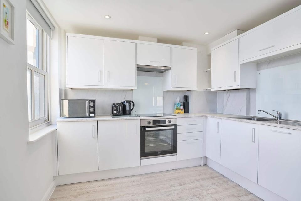 Kitchen or kitchenette, oven, stove