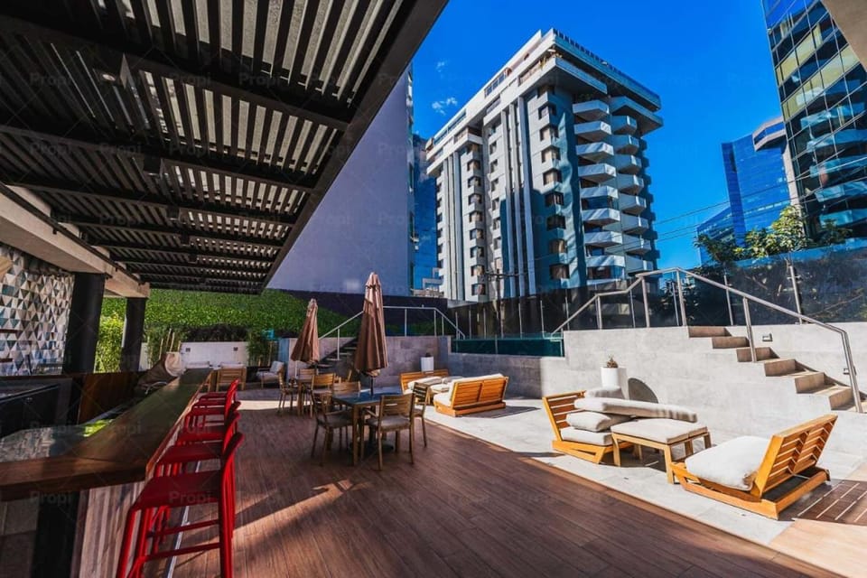 Property building, Hot Tub, View (from property/room), Seating area, Swimming pool