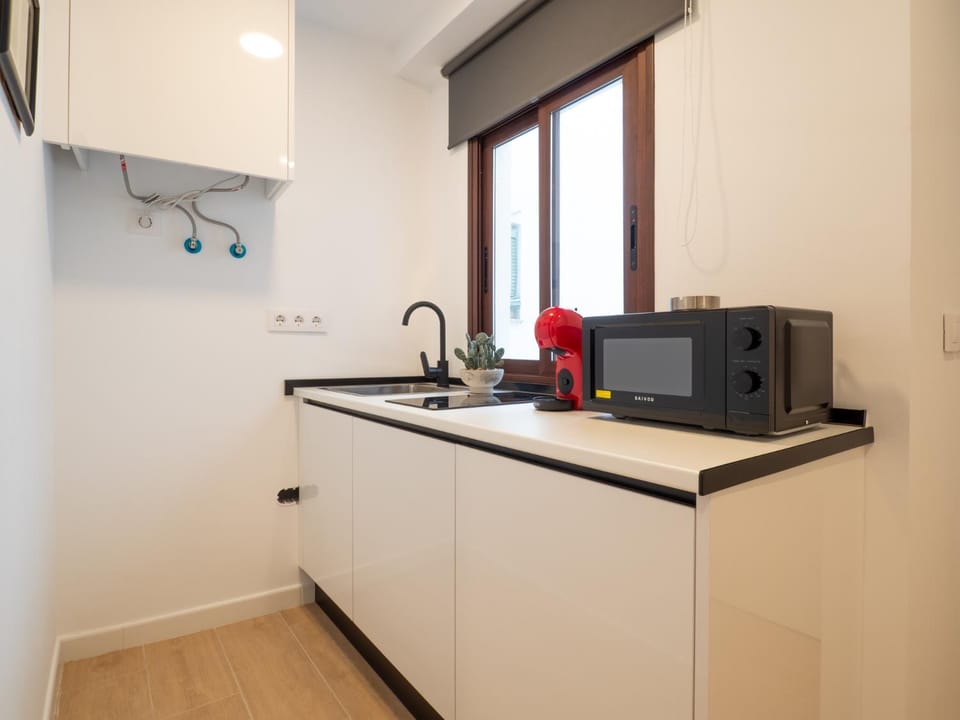 Kitchen or kitchenette, stove