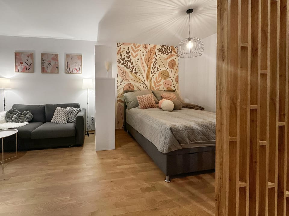 Bed, Living room, Seating area, Bedroom