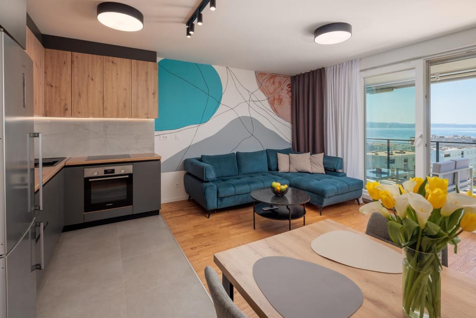 Kitchen or kitchenette, Living room, Seating area, Dining area