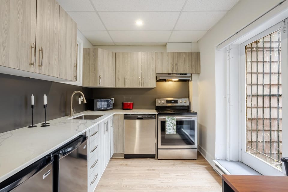 Kitchen or kitchenette, dishwasher, oven, stove, toaster