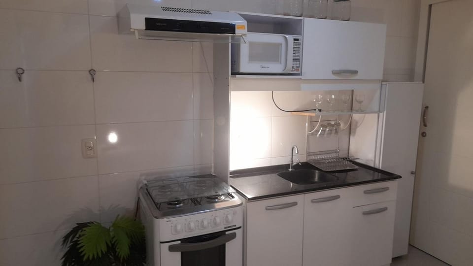 Kitchen or kitchenette, stove, toaster