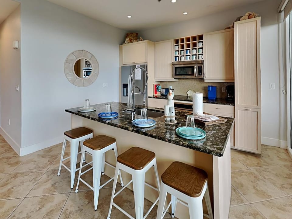 Kitchen or kitchenette, Seating area, furniture, microwave, stove, toaster, kitchen