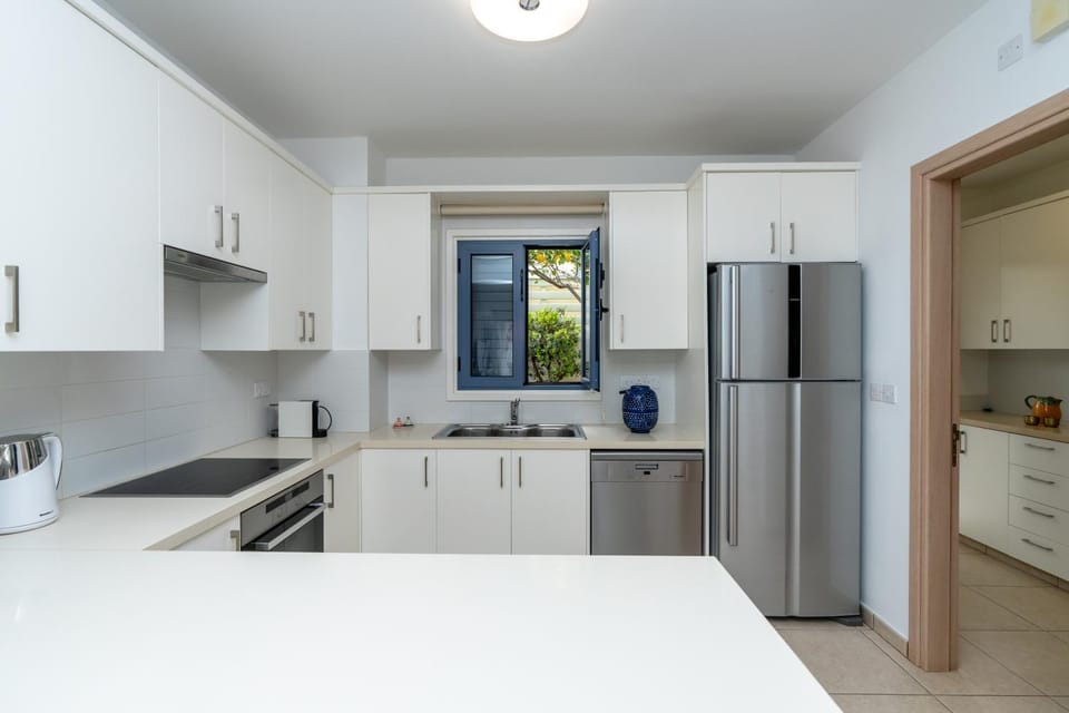 Kitchen or kitchenette, dishwasher, oven, stove