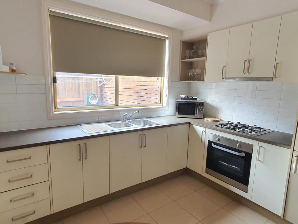 Kitchen or kitchenette, microwave, oven, stove, kitchen