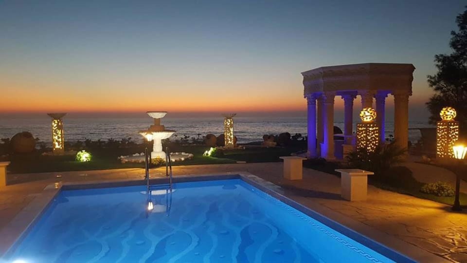 Luxury Beachfront Villa with a Pool House in Paphos District