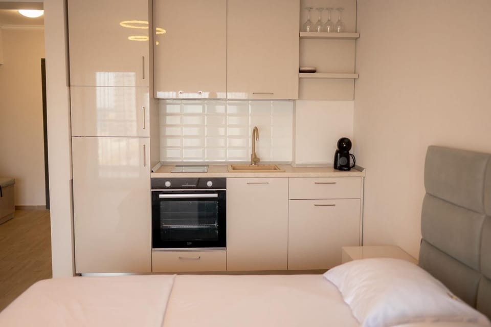 Kitchen or kitchenette, oven, stove