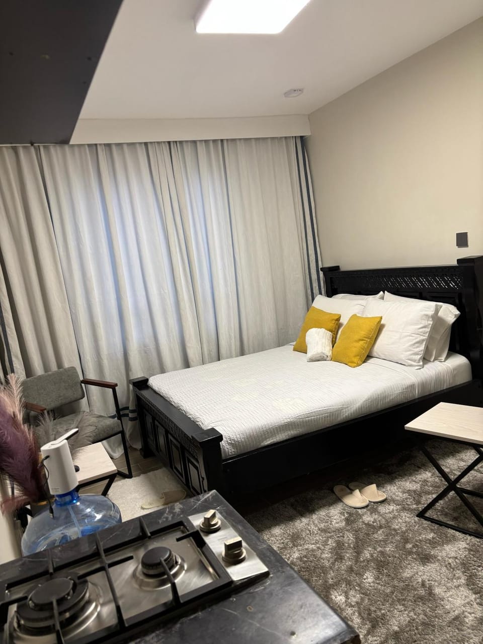 Bed, Living room, Seating area, Bedroom