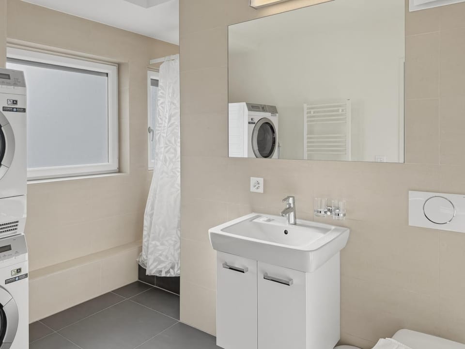 Shower, Toilet, Bathroom, towels, washing machine, dryer