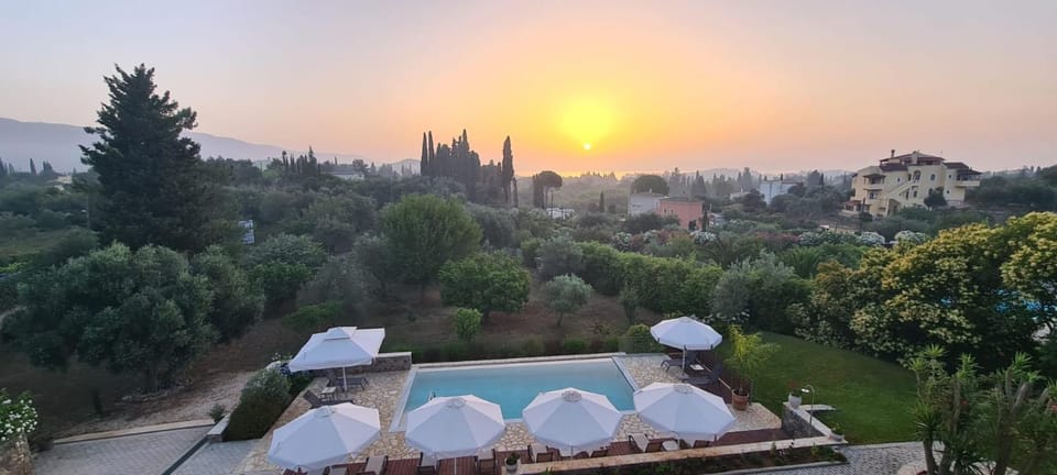 View (from property/room), Garden view, Swimming pool, Sunrise
