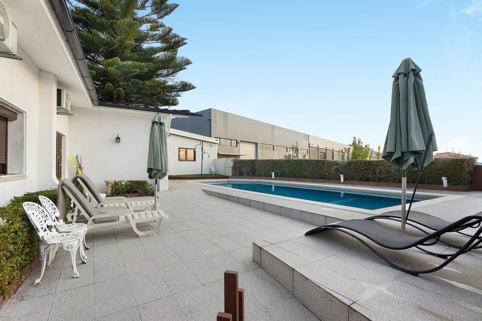 Property building, Living room, Swimming pool