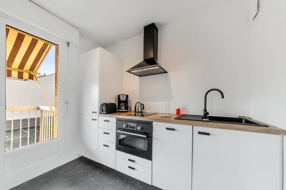 Kitchen or kitchenette, stove, toaster