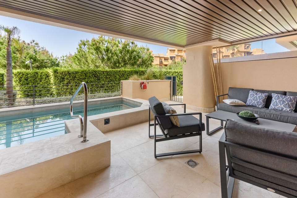 Property building, Living room, Swimming pool