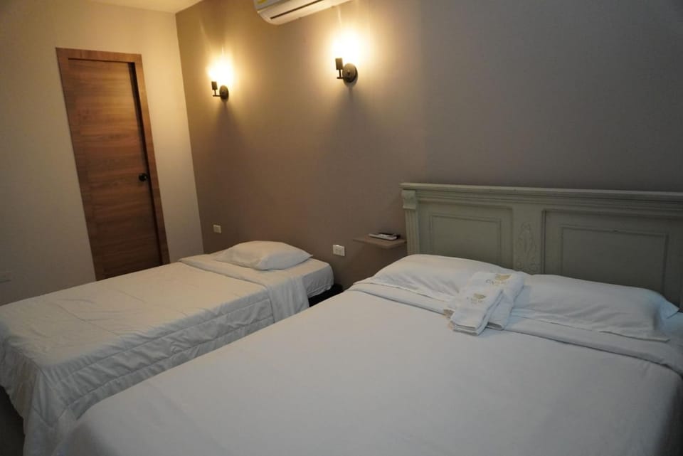 Bed, Photo of the whole room, Bedroom, towels, air conditioner