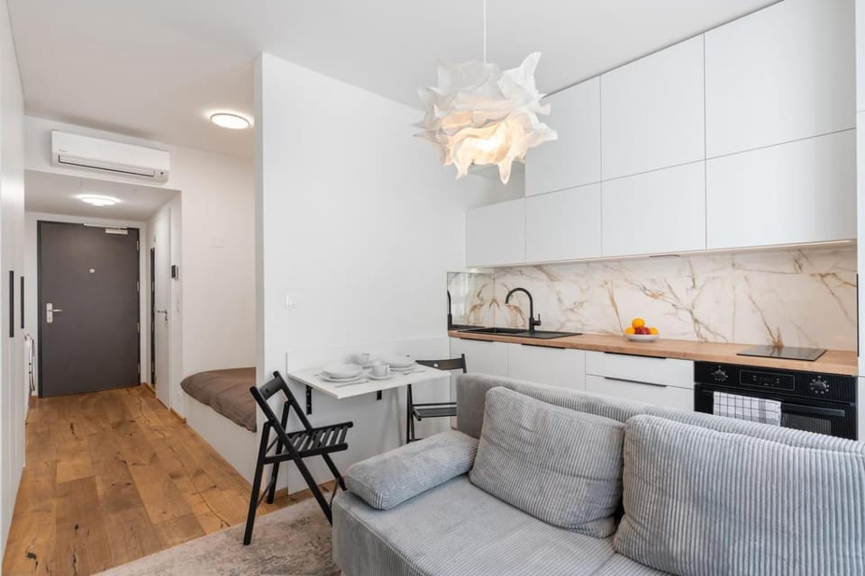 Kitchen or kitchenette, Living room, Seating area, Dining area, oven, stove, air conditioner
