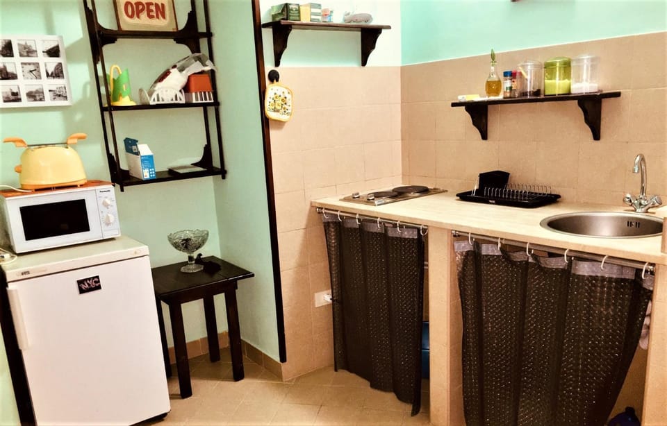 Kitchen or kitchenette, stove