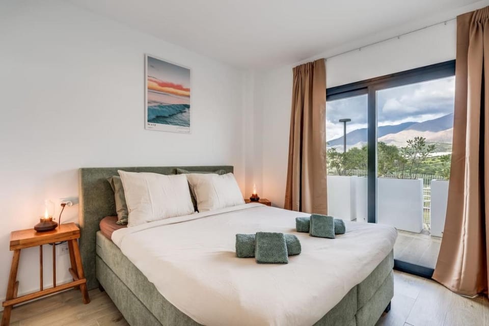 Bed, Natural landscape, towels, air conditioner